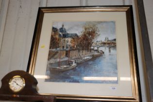 A large framed coloured print of a river scene