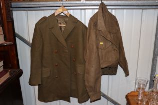 A battle dress blouse, trousers and trench coat