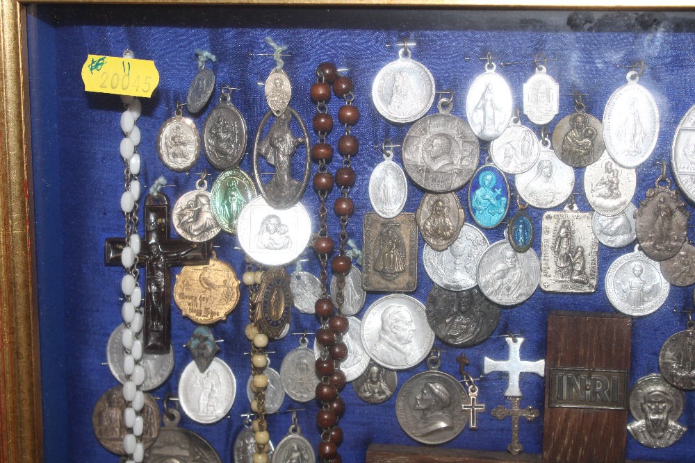 A display case of Papal medallions; rosary beads; - Image 2 of 13