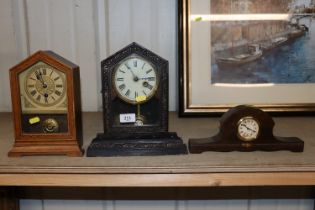 Three mantel clocks