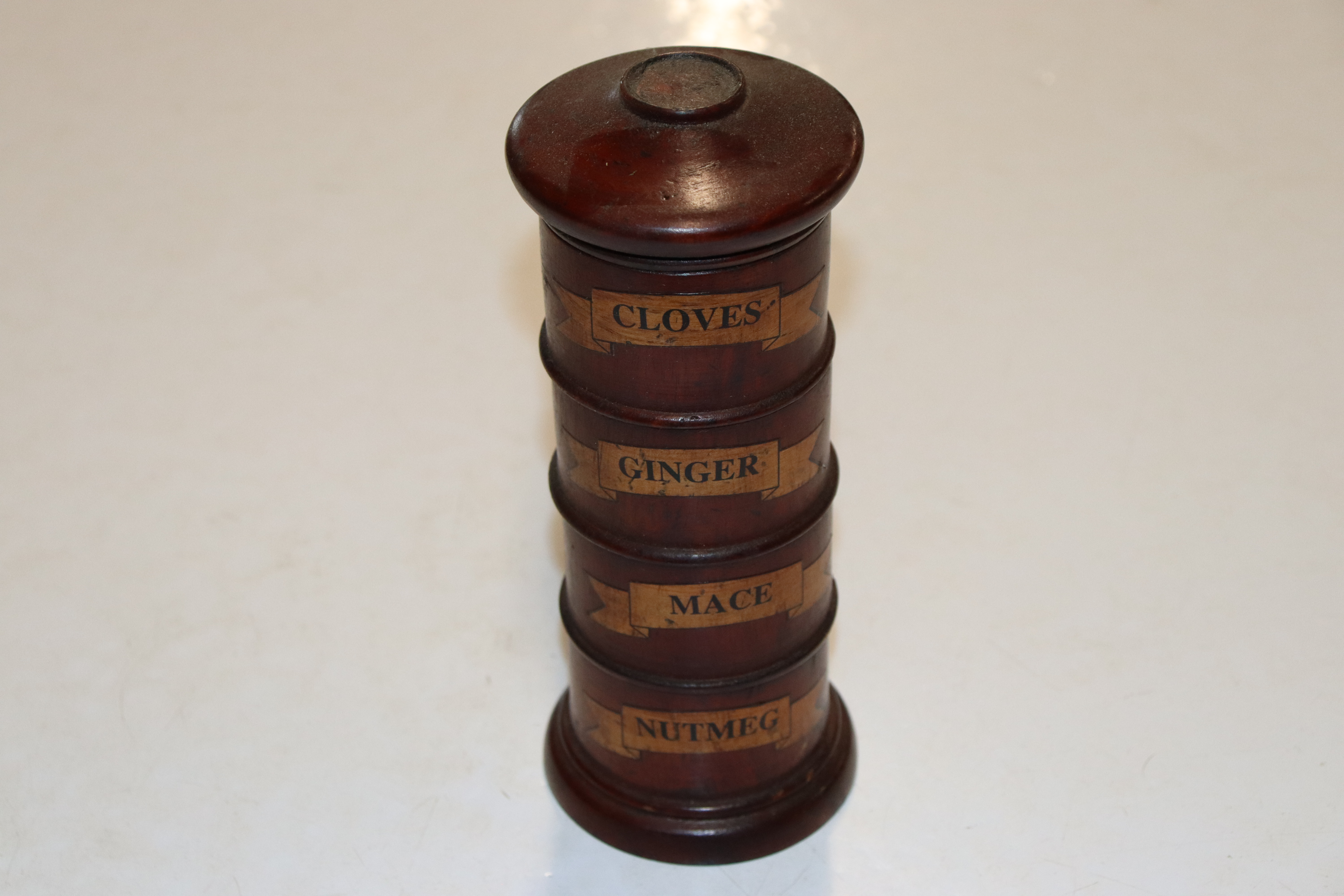 A wooden spice tower