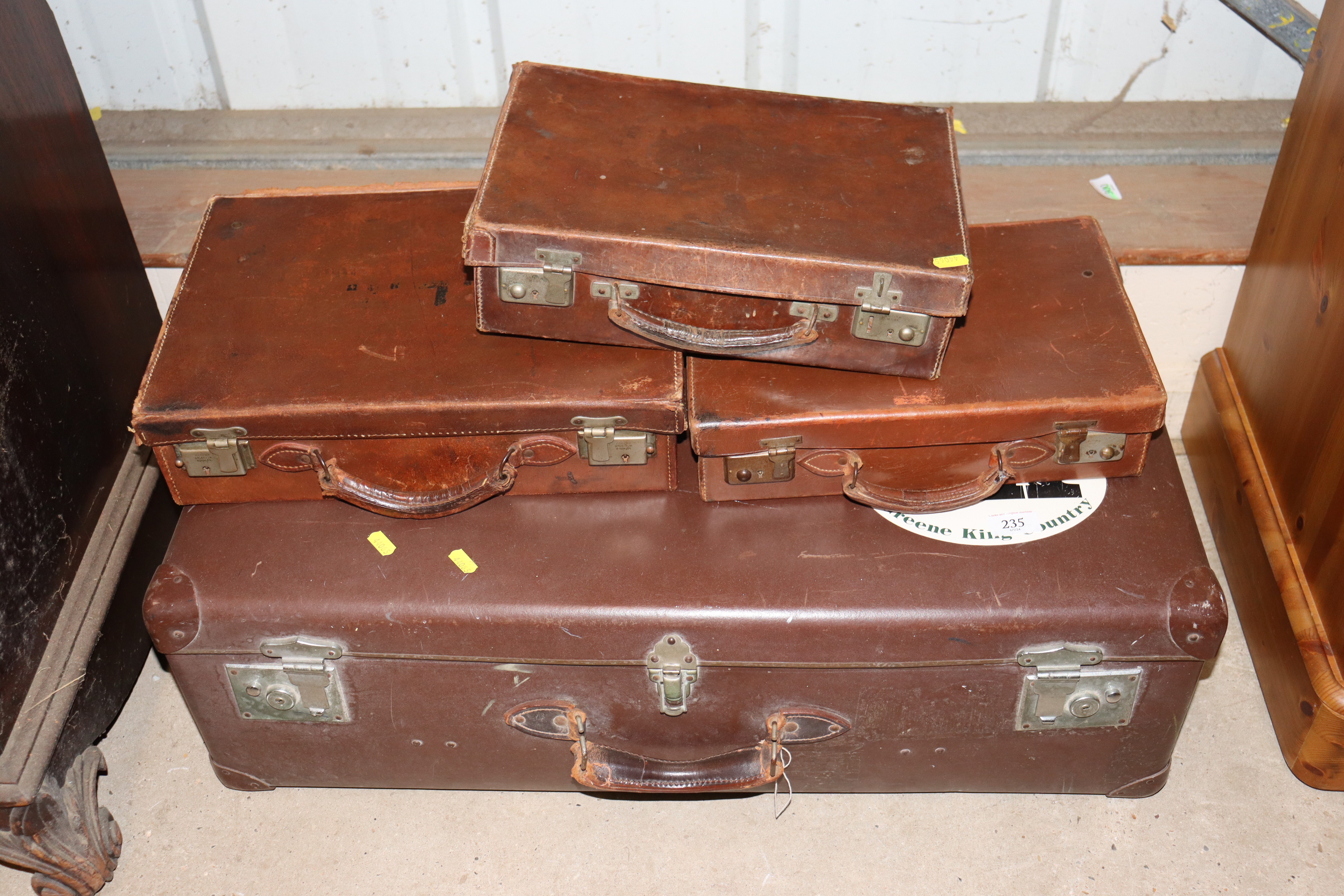 Four vintage suitcases