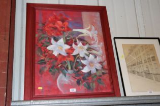 A framed and glazed pastel study of lilies, signed