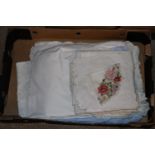 A box of various linens and cloth