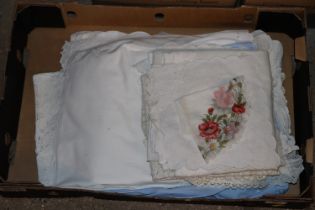 A box of various linens and cloth