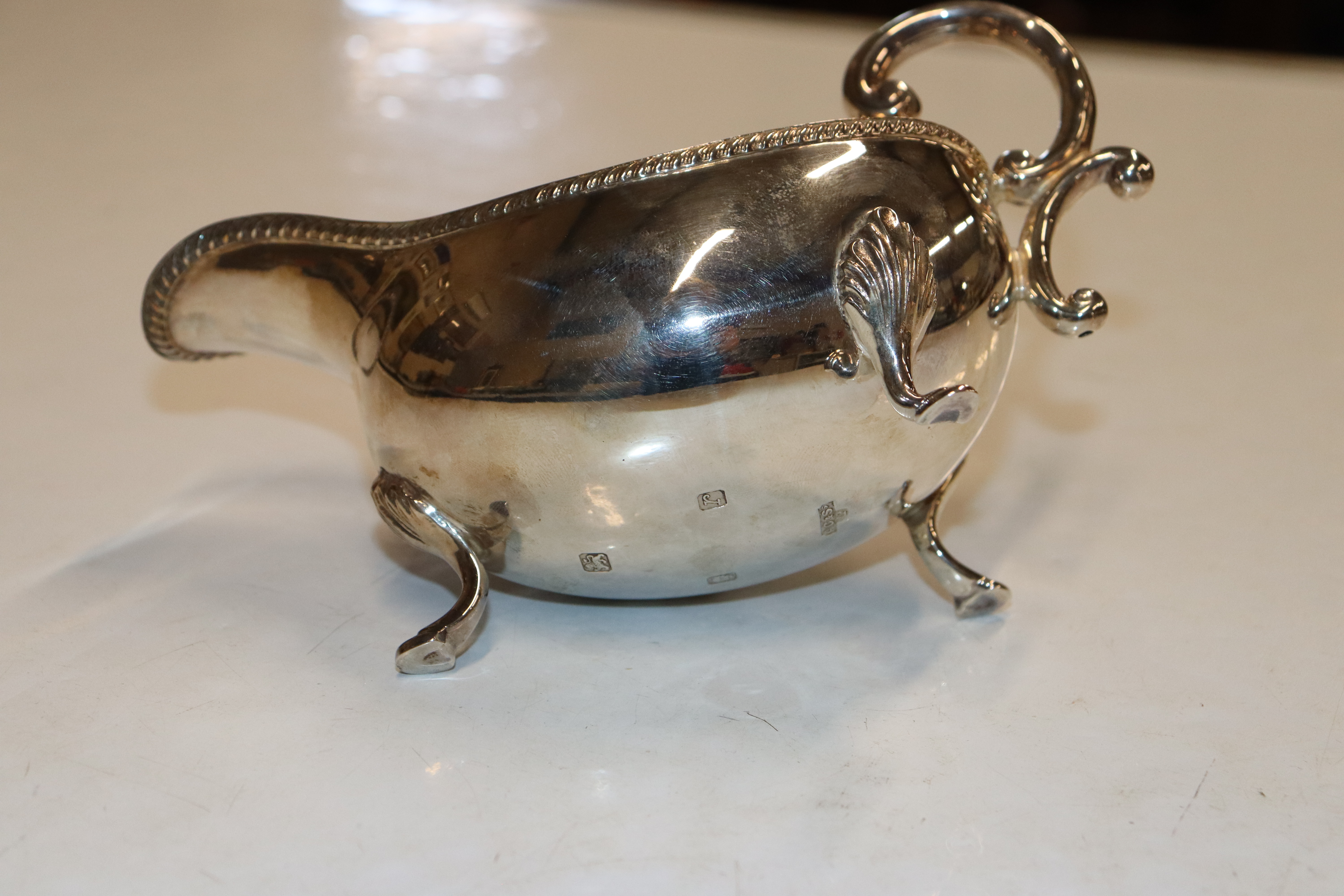 A pair of silver sauce boats with scroll handles, - Image 9 of 11