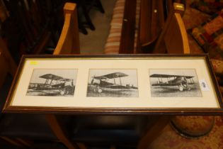 A framed and glazed print of three bi-planes