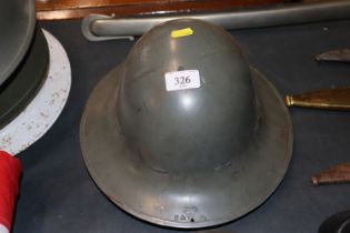 Two WWII Fire Watchers helmets