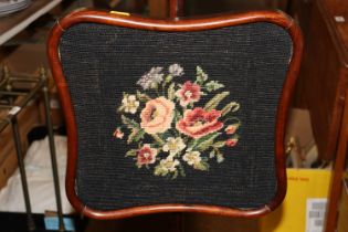 A Victorian rosewood pole screen