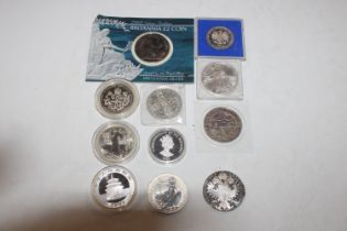 A box of silver and other commemorative coins