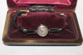 A ladies Bulova wrist watch in original box