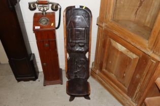 A carved African hardwood native seat with naïve d