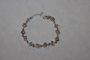 A Sterling silver cubic zirconia tennis type brace