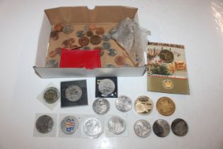 A box containing various £5 coins, crowns and othe