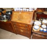 A mahogany four drawer bureau