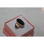 A Sterling silver and black onyx set ring, ring si