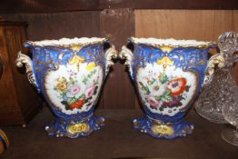 A pair of continental gilt and floral decorated va