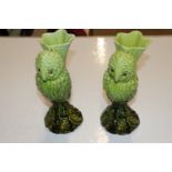 A pair of Burmantoft style green glazed vases in t