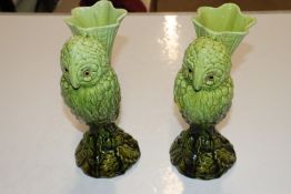 A pair of Burmantoft style green glazed vases in t