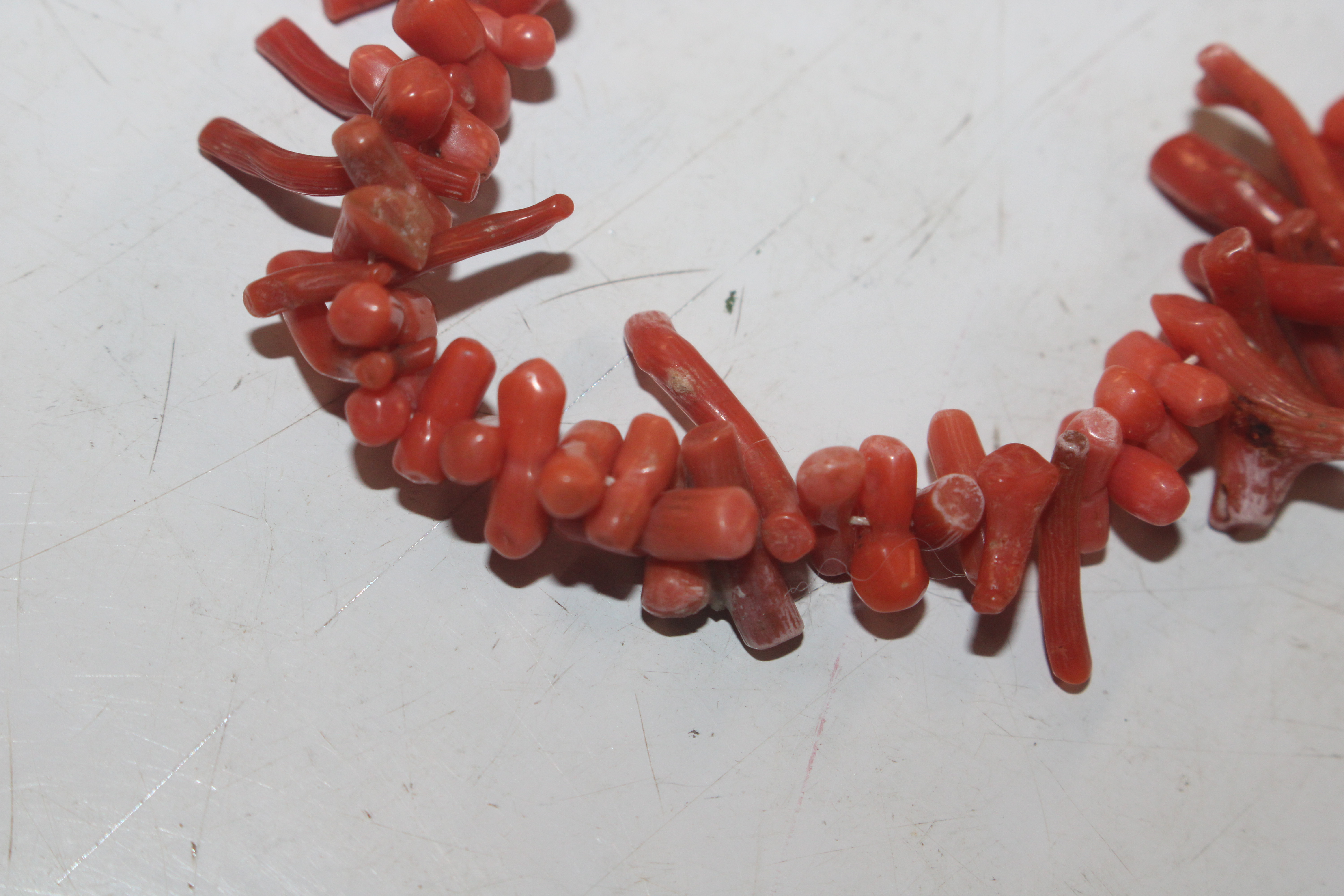 A box of jewellery to include coral necklace, yell - Image 7 of 11