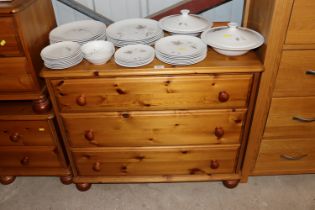 A modern pine chest fitted three drawers