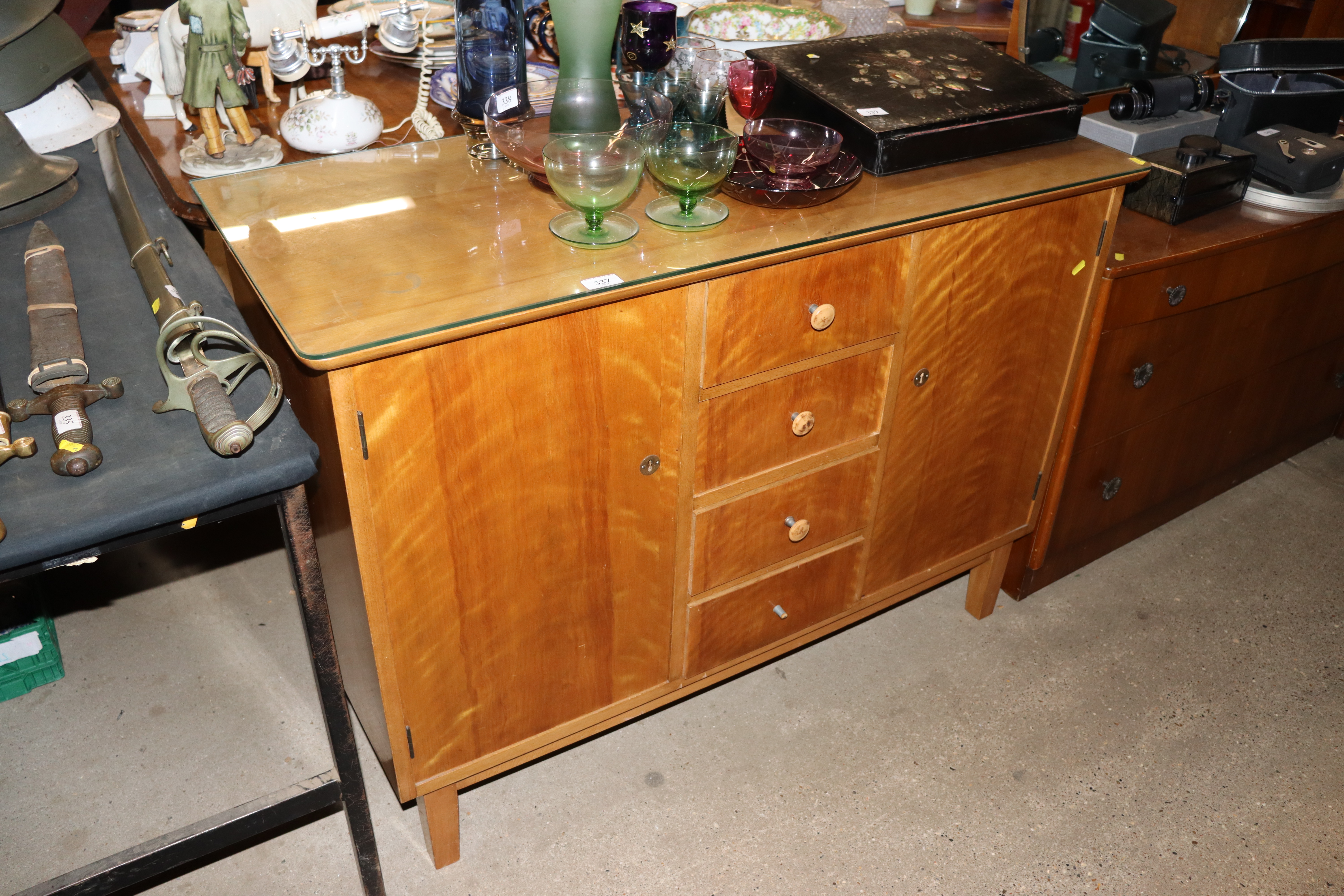 A mid-20th Century Continental walnut sideboard