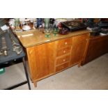 A mid-20th Century Continental walnut sideboard