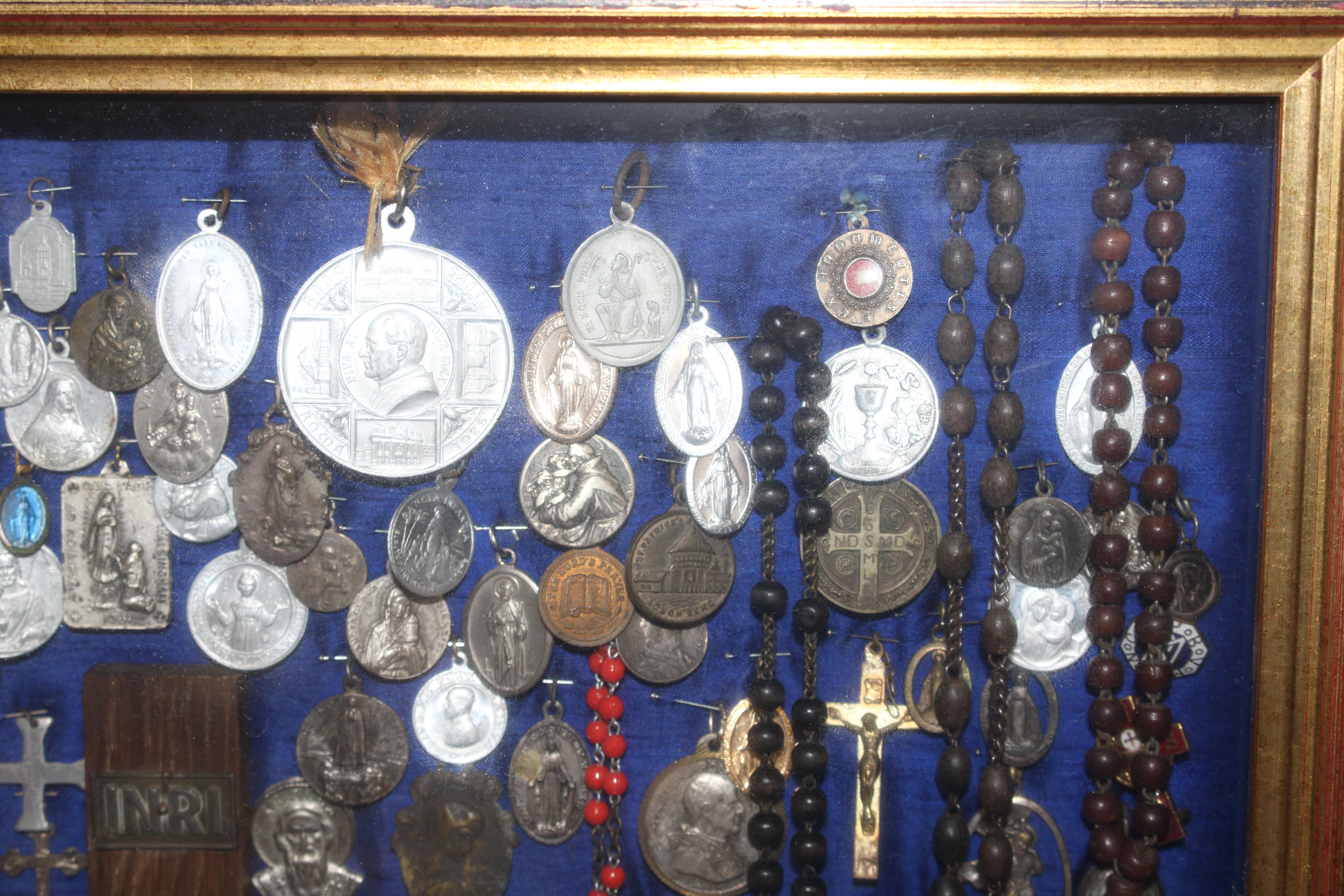 A display case of Papal medallions; rosary beads; - Image 3 of 13