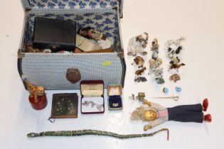 Two boxes containing various animal ornaments to i