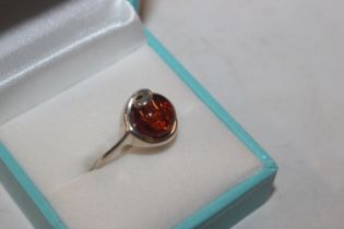 A Sterling silver and amber set ring, ring size N/