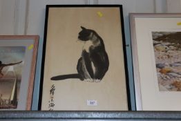 A framed and glazed Oriental study of a cat, chara