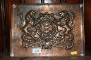 A coppered plaque decorated with a Royal cipher