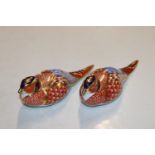 A pair of Royal Crown Derby paperweights in the fo