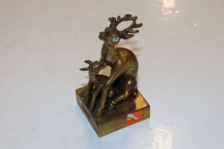 A gilt bronze double deer seal