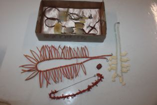 A box of jewellery to include coral necklace, yell