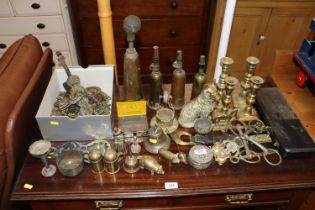 A quantity of various brassware to include horse b