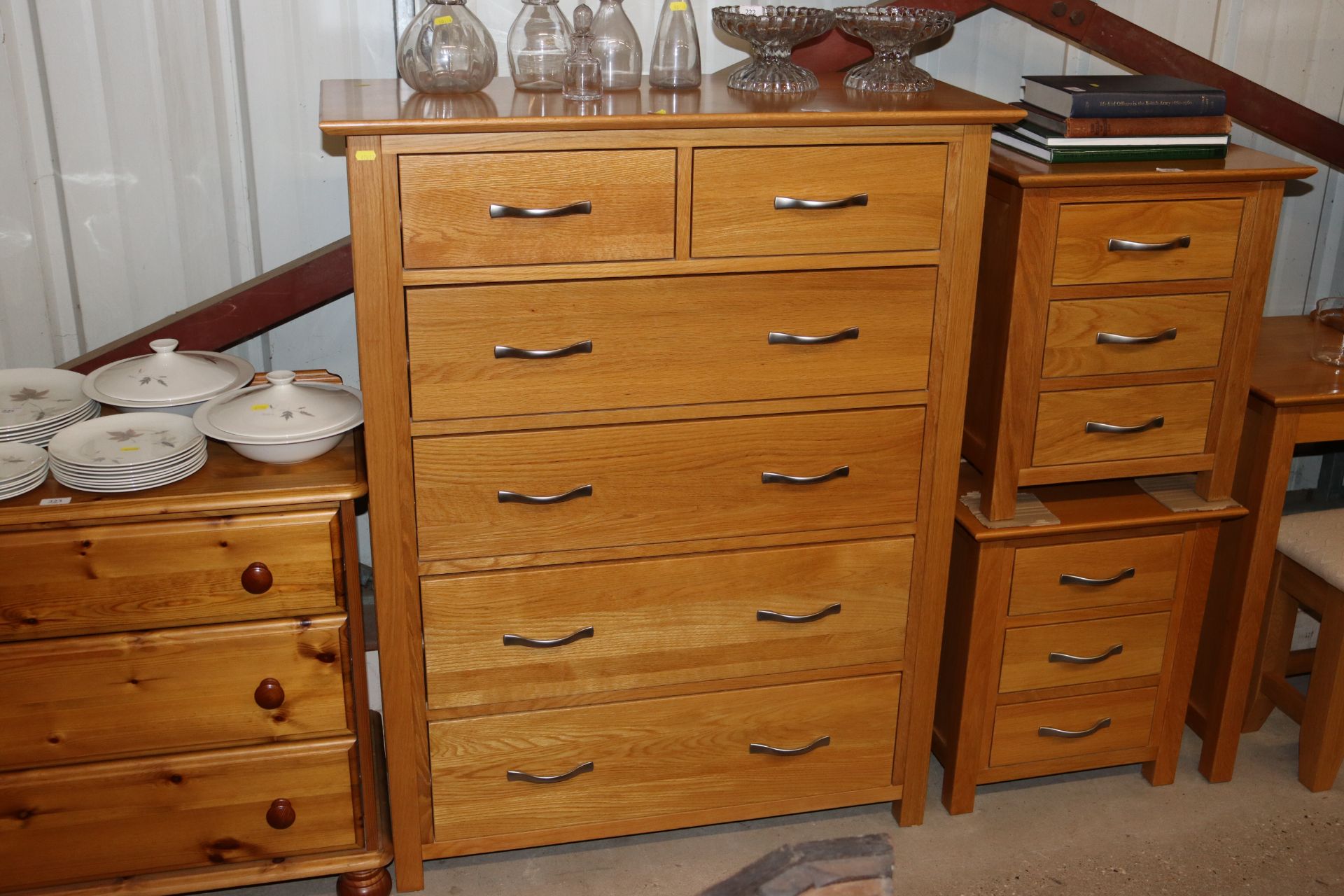 A light oak chest fitted two short over four long
