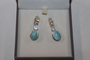 A pair of Sterling silver blue topaz clip ear-ring