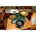 A set of cast iron and brass kitchen scales by J&J