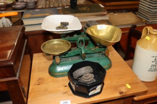 A set of cast iron and brass kitchen scales by J&J