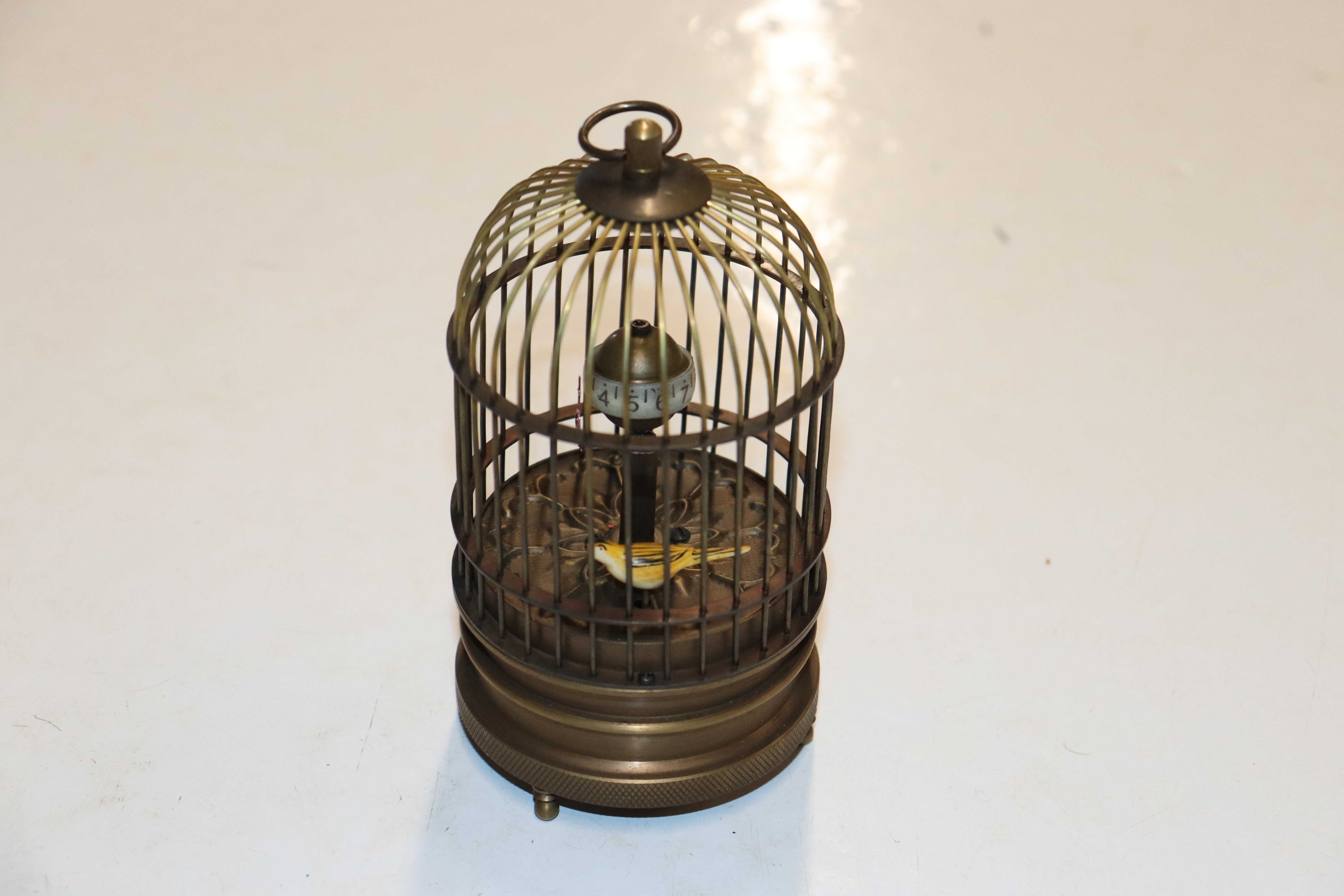 A bird cage clock