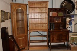 A large stripped pine shelving unit