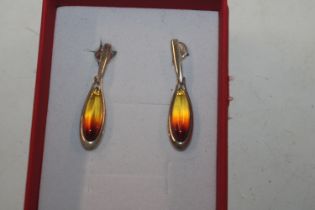 A pair of Sterling silver and amber drop ear-rings