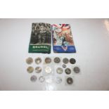 A box containing various £2 coins and 50pence piec