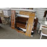 A collection of knitting machines and stands, toge