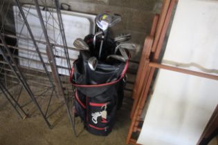 A Callaway golfing bag and contents of clubs inclu