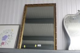A gilt framed and bevel edged wall mirror