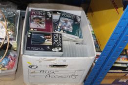 A box of Agatha Christie Poirot DVDs
