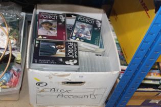 A box of Agatha Christie Poirot DVDs