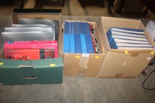 Three boxes of books relating to cars
